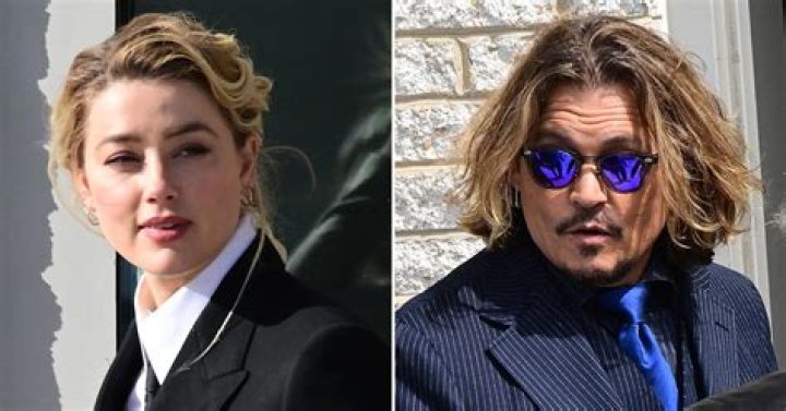 Amber Heard denies pooping on Johnny Depp's side of the bed in testimony, blames dog